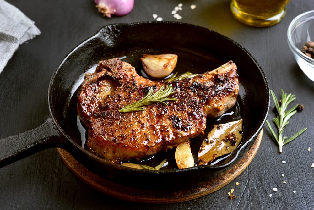 Cumin-Spiced Pork Chop in cast iron pan